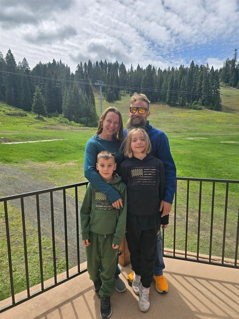 Derek Domeny, founder and cabinet maker at Idaho Custom Cabinets, with his family in the Idaho mountains